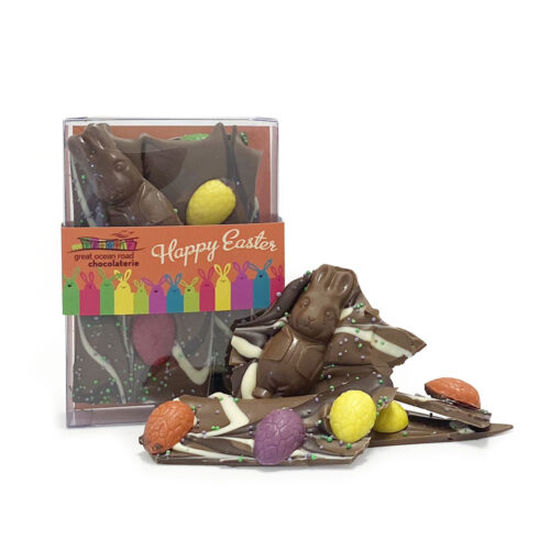 Couverture milk chocolate with marble swirls of dark and white chocolate topped with hoppy friends and colourful eggs.